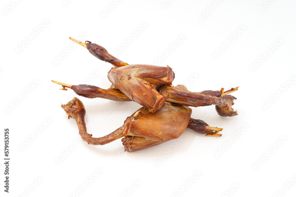 Obraz premium Fresh marinated quail in monochrome background