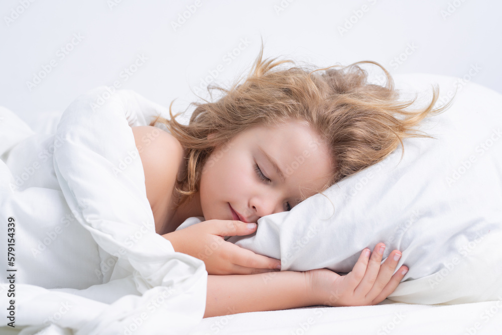 Kid sleeping in cozy white bed. Child boy take nap. Kid sleeping in bed. Comfortable mattress on bedroom. Soft pillow, comfy, cozy comfortable bed concept. Healthy kids sleeping. Kid sleeping in cozy white bed. Child boy take nap. Kid sleeping in bed. Comfortable mattress on bedroom. Soft pillow, comfy, cozy comfortable bed concept. Healthy kids sleeping.