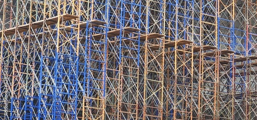 Scaffolding In Construction Site For High  Rise Building photo