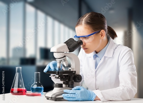 Modern Research Laboratory: Scientist work with Microscope