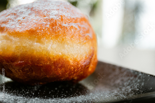 Bakery shop products - various kinds of baguette, bagel, donut, croissant, rolls, bread, puff pastry, powdered sugar delicious pies. Neutral background. Food from bakeries.