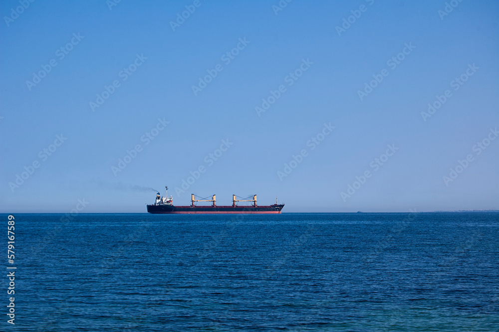 cargo ship sailing on the ocean
