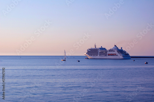 the cruise ship leaves the port for a journey © ArtifexDi