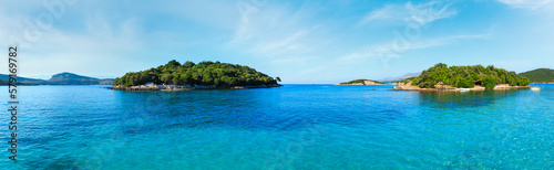 Beautiful Ionian Sea with clear turquoise water and morning summer coast. View from Ksamil beach, Albania.