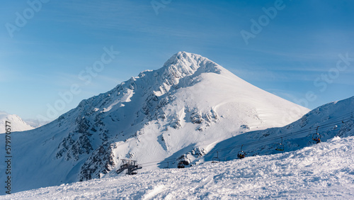 panoramic mountain landscape with a lot of snow in winter. Mountain in Asturias, Spain- ski slope