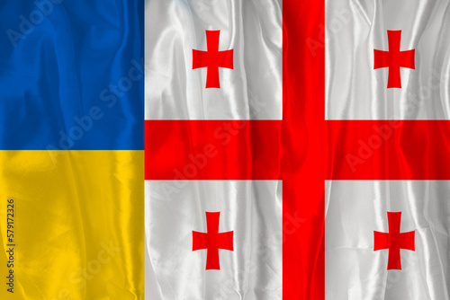 The flag of Georgia and the flag of Ukraine. Flag of the country of Georgia and Ukraine together. Conceptual image of Georgia and Ukraine