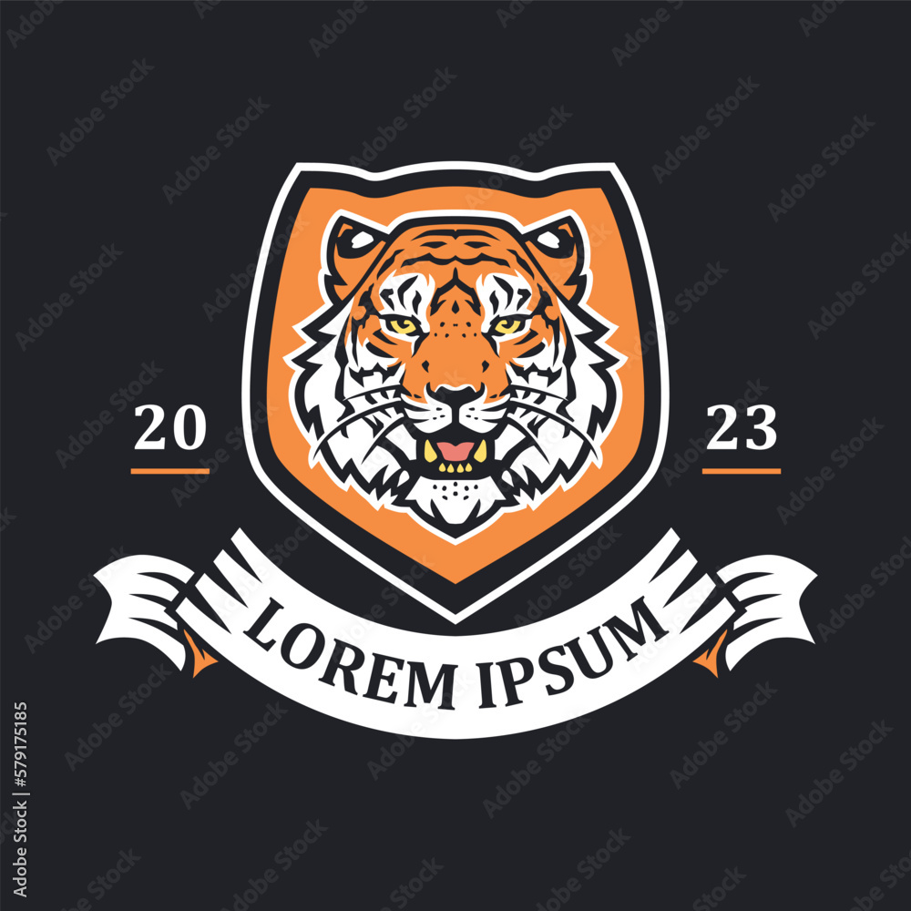 Tiger head emblem illustration template. Big cat shield mascot logo. Can be used for badges, banners, or merch. Tiger head emblem illustration template. Big cat shield mascot logo. Can be used for badges, banners, or merch.