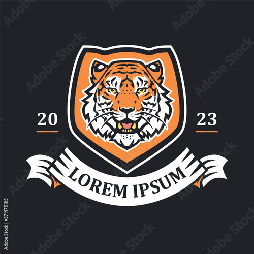 Tiger head emblem illustration template. Big cat shield mascot logo. Can be used for badges, banners, or merch.