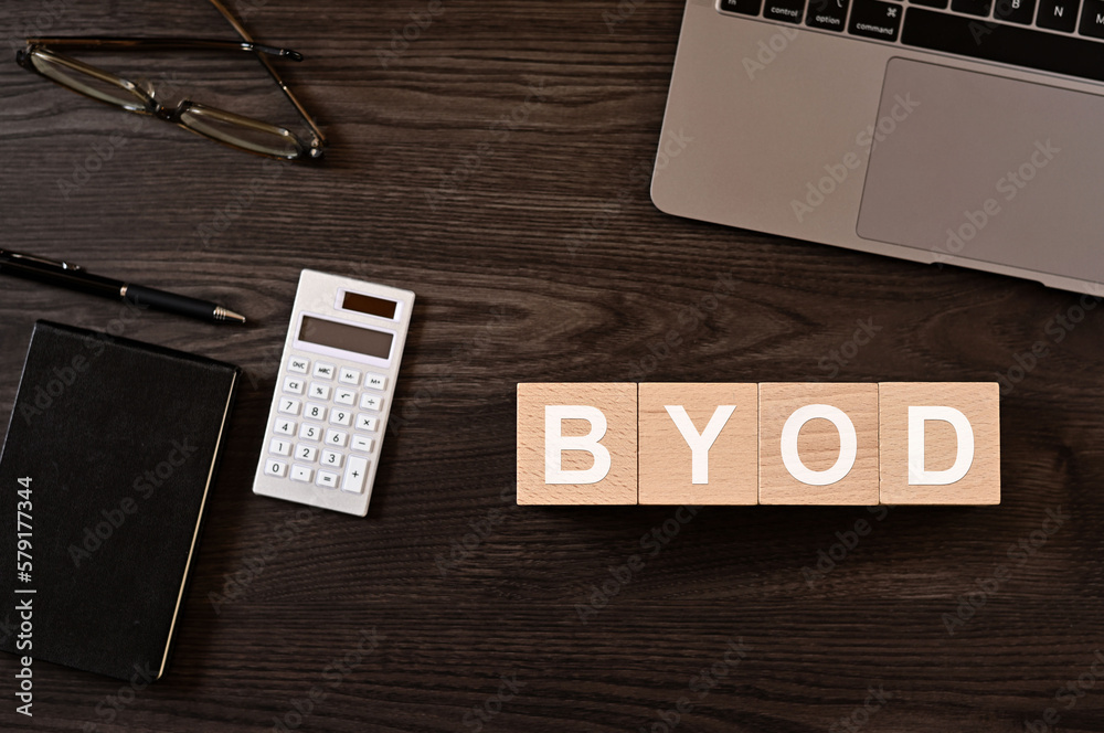 There is wood cube with the word BYOD. It is eye-catching image.