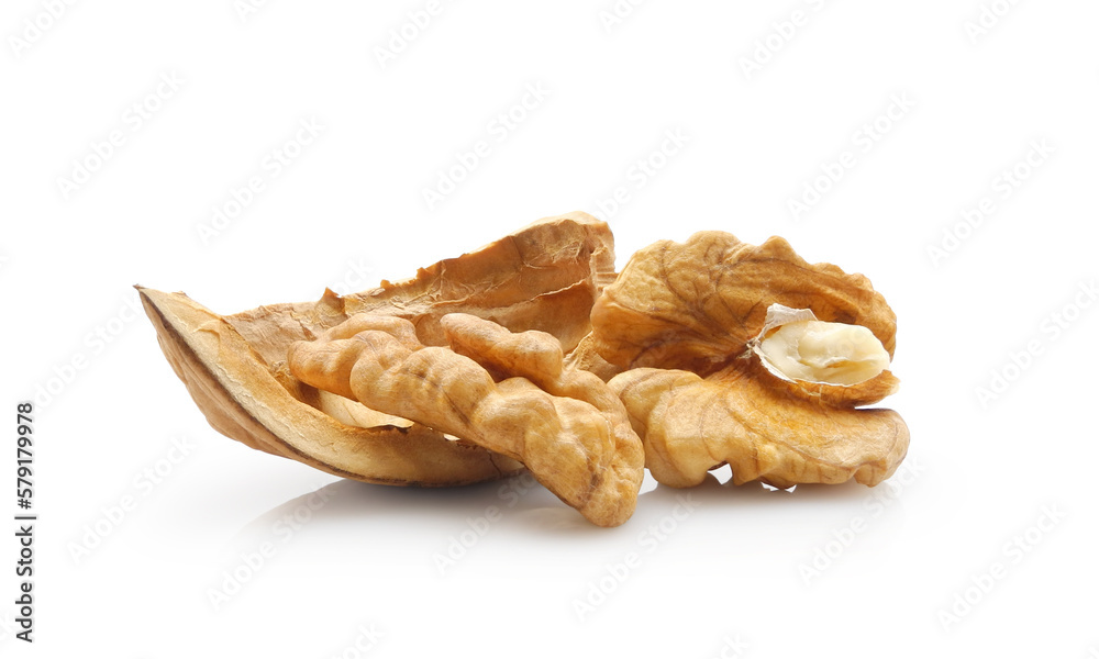 Peeled walnut, kernel with nutshell isolated on white close-up