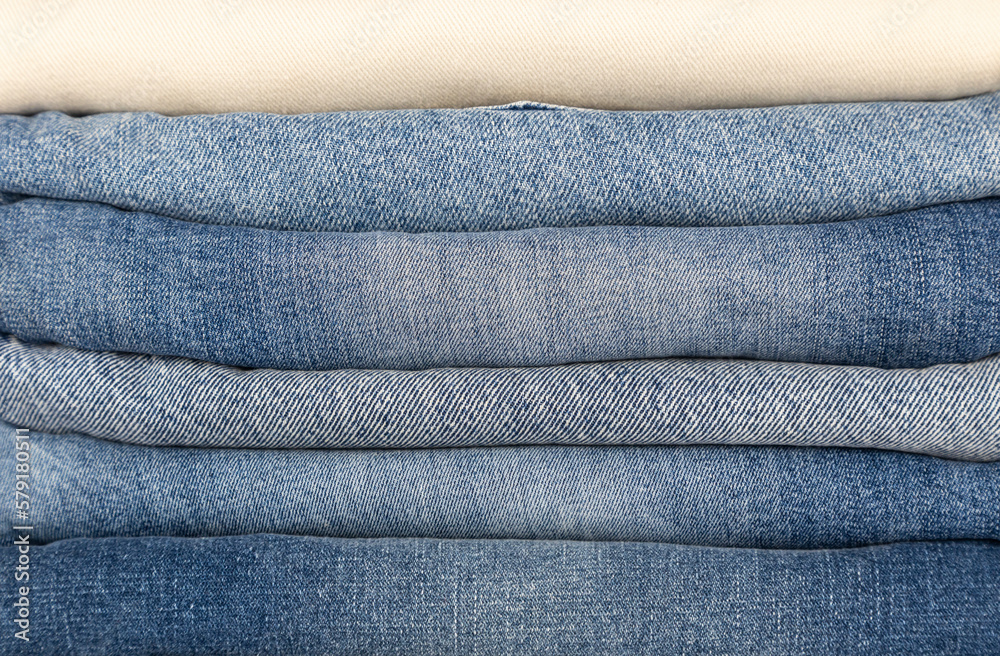 Denim textures of different colors are piled up. Denim textures of different colors are piled up.