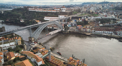 Porto  Portugal - 12.25.2022  Aerial view of the old city and the Don Luis bridge in Porto. High quality photo