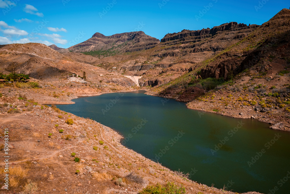 Rocky mountain and lake water dam in the Canary Islands at Gran Canaria, Spain