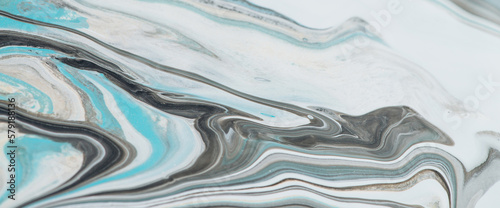Fluid art background with light blue tints on white stony surface. Liquid ink marble imitation. Marbling effect of acrylic paints on canvas. Abstract marble texture with mixing colors. Modern interior © Daniil