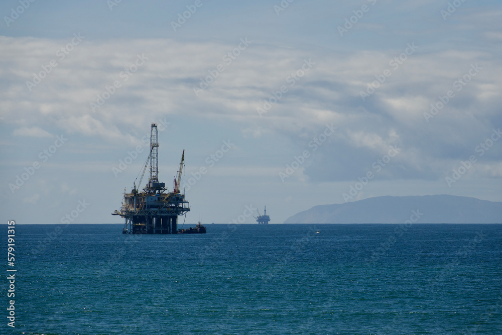 oil rig platform with cranes out at sea oil rig platform with cranes out at sea
