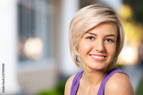 Happy young beautiful female on the street. Free Download Happy young beautiful female on the street. - GFXLoad
