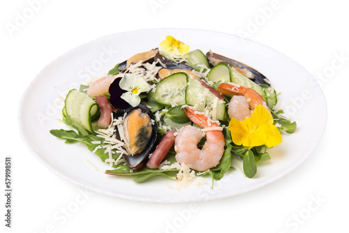 Plate of delicious salad with seafood isolated on white