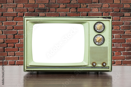 Old green television with b...