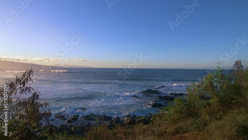 Wallpaper Mural Hawaii ocean cliff surfers golden hour slow motion Torontodigital.ca
