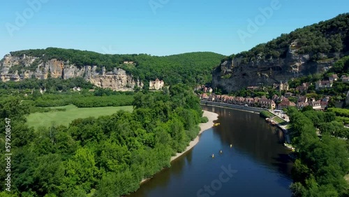 Smooth 4K footage heading up the river in La Roque-Gageac, which is is a commune in the Dordogne department in Nouvelle-Aquitaine, southwestern France.