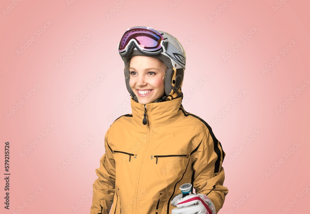 Young snowboarder woman posing on background Young snowboarder woman posing on background