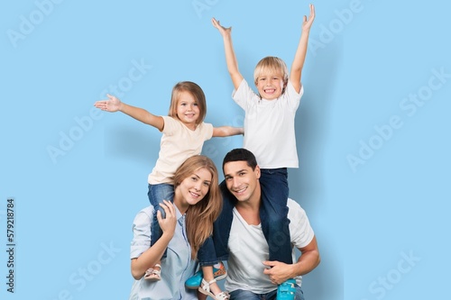 Happy young family with child posing