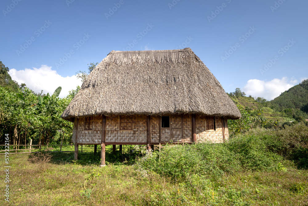 Rong house in Bahnar villages in Highland Vietnam. Rong house is used as a place to organize festivals, village meetings, is the communal house of Bahnar, Jar Rong house in Bahnar villages in Highland Vietnam. Rong house is used as a place to organize festivals, village meetings, is the communal house of Bahnar, Jar