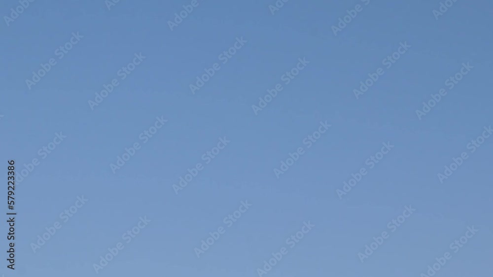 isolated young girl standing at mountain top with blue sky from flat angle video is taken at kaylana lake jodhpur rajasthan india. isolated young girl standing at mountain top with blue sky from flat angle video is taken at kaylana lake jodhpur rajasthan india.