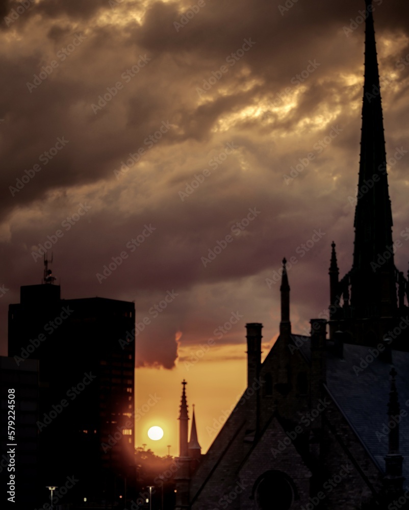 Fototapeta premium Sunset behind a city church.