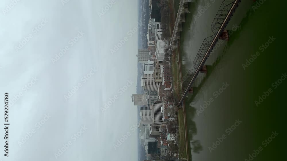 Aerial drone video of city along river waterfront. Aerial drone video of city along river waterfront.