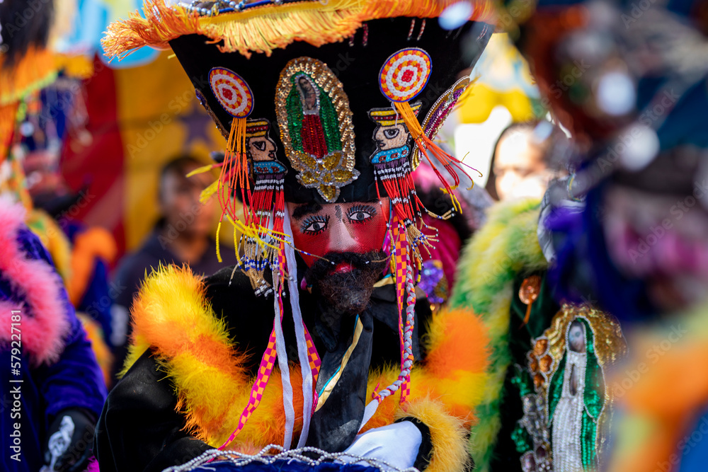 Close up of chinelo mask dancing in a carnival in the State of Mexico- Mexican Culture