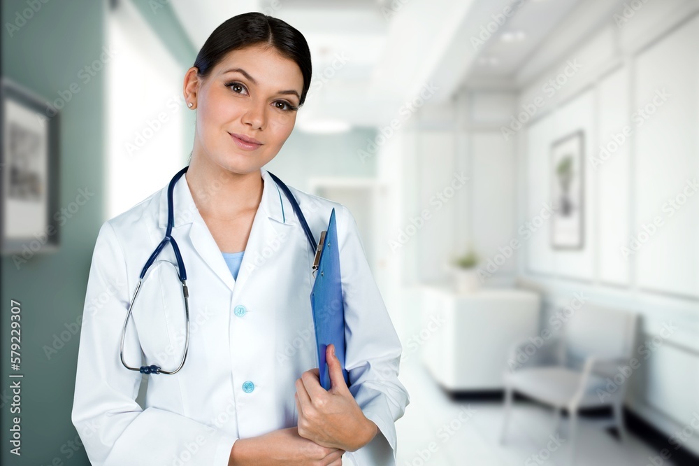 Young confident doctor with document in laboratory Young confident doctor with document in laboratory