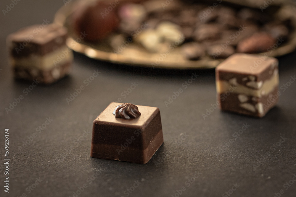 Superfood chocolates, pralines on dark background Superfood chocolates, pralines on dark background