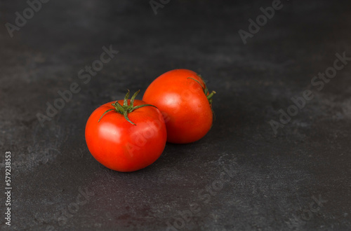 tomatoes on a wooden background