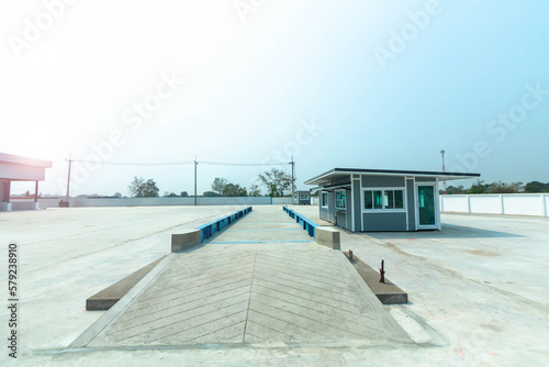 Weighing the car on the container 