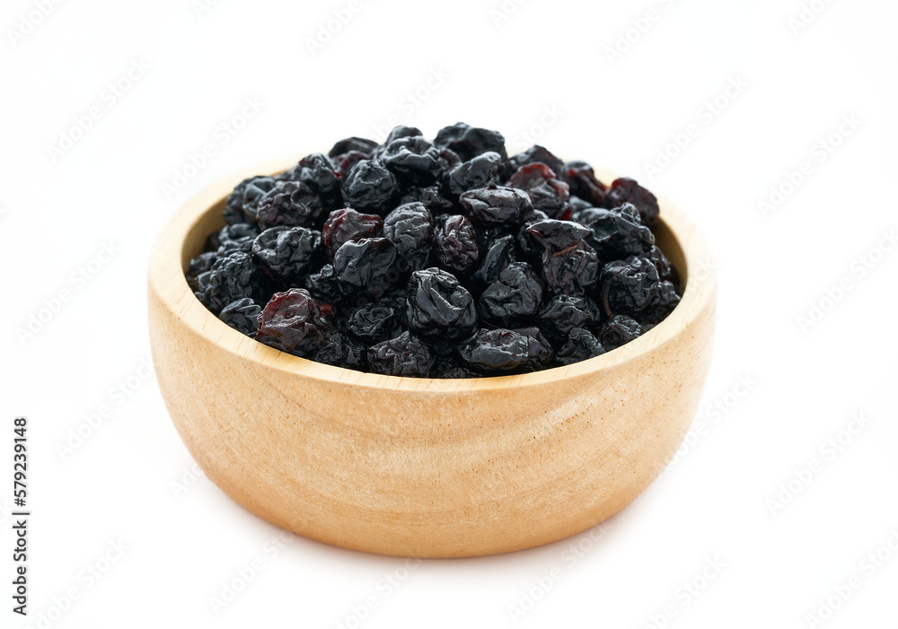 dry blueberry or blackberry in wood bowl isolated on white background. pile of dry blueberry or blackberry isolated. dry blueberry or blackberry isolated dry blueberry or blackberry in wood bowl isolated on white background. pile of dry blueberry or blackberry isolated. dry blueberry or blackberry isolated