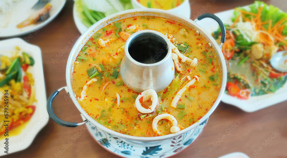 Thai Food Tom Yum Seafood, Tom Yum Kung Creamy spicy soup Hot Pot. Thai Food Tom Yum Seafood, Tom Yum Kung Creamy spicy soup Hot Pot.
