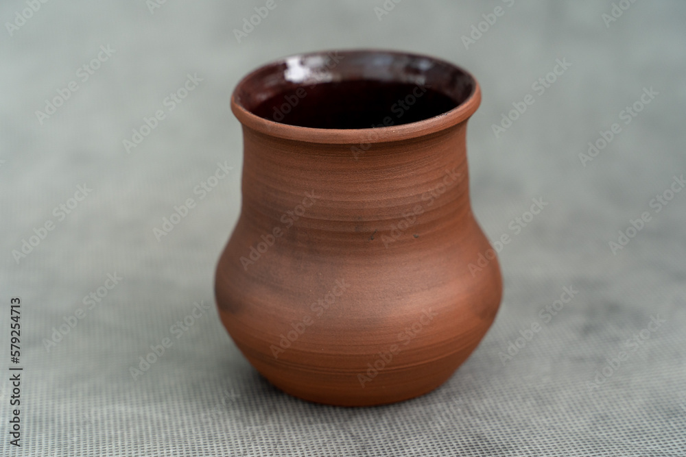 Ceramics, a ceramic product made with their own hands on a potter's wheel, a mug. Ceramics, a ceramic product made with their own hands on a potter's wheel, a mug.