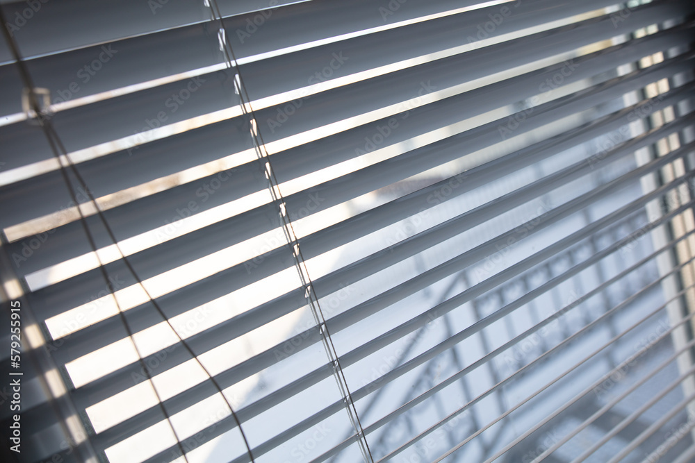 Blinds on the window as an abstract background. Blinds on the window as an abstract background.