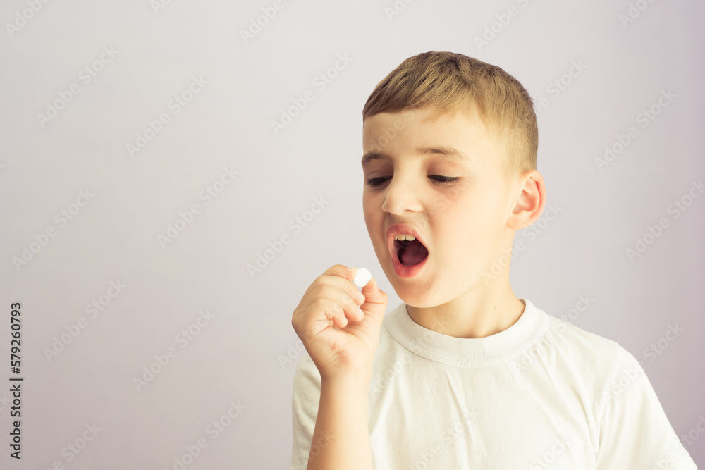 the child is given medicine pills the child is given medicine pills