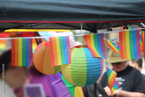 Sydney, NSW  Australia - February 19 2023: Rainbow bunting and lanterns hung from a stand. WorldPride photo