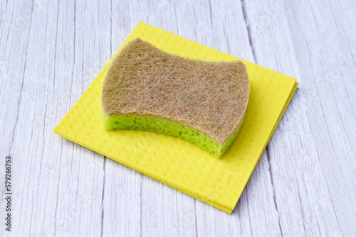 Dishwashing sponge and kitchen wipes on white background, top view. Sponges for dishes. Cleaning concept