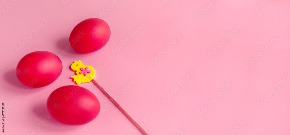 Easter card with painted eggs and little chicken made of felt on a stick. Copy space. Easter card with painted eggs and little chicken made of felt on a stick. Copy space.