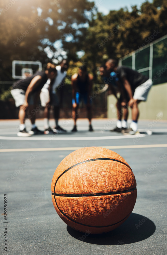 Basketball, ball and outdoor court with athlete group or team talk strategy during break at game for motivation and teamwork for streetball. Male players in the USA playing for fitness and exercise Basketball, ball and outdoor court with athlete group or team talk strategy during break at game for motivation and teamwork for streetball. Male players in the USA playing for fitness and exercise