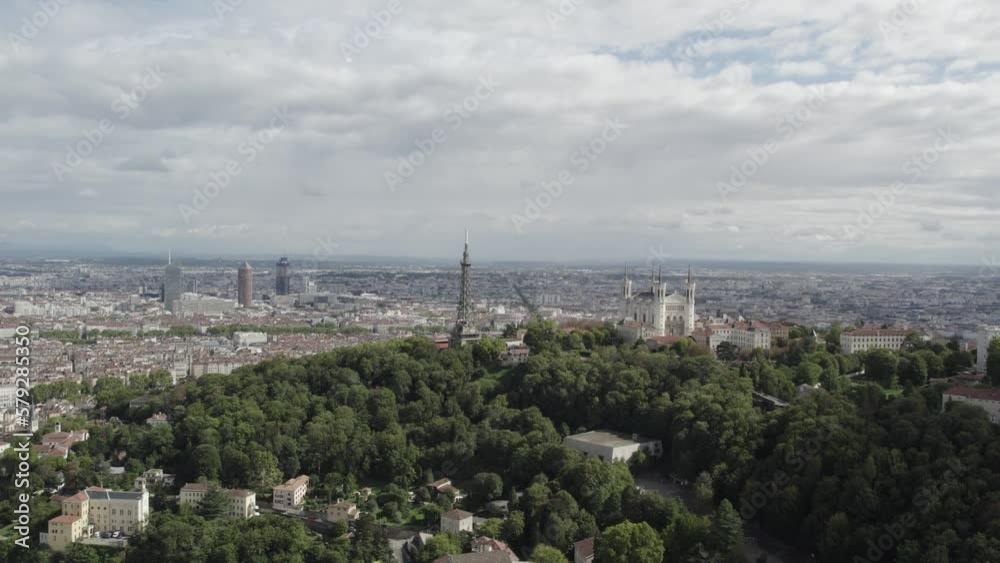 Metallic Tower and Notre Dame Basilica on top of Fourvière hill in Lyon France, Aerial dolly right shot Metallic Tower and Notre Dame Basilica on top of Fourvière hill in Lyon France, Aerial dolly right shot