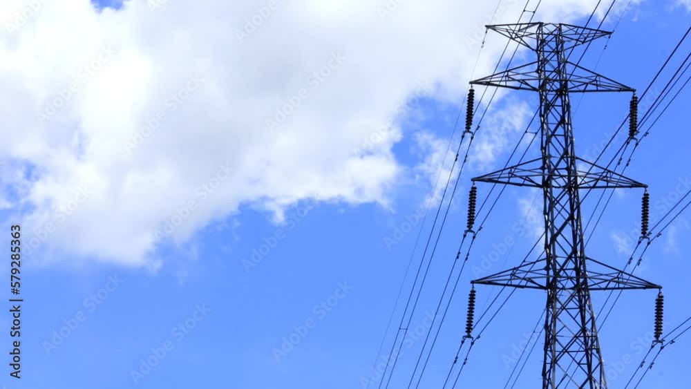 power lines. blue sky with clouds. cloud timelipse bright blue sky background. white cloud hyperlipse. summer weather in the countryside. no people.
power lines. blue sky with clouds. cloud timelipse bright blue sky background. white cloud hyperlipse. summer weather in the countryside. no people.