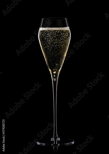 Glass of prosecco champagne wine on black.