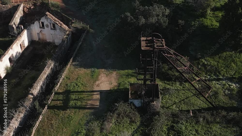 Aerial shot of abandoned buildings and elevator towers in the ghost town of Sao Domingo Mine, dark tourism Aerial shot of abandoned buildings and elevator towers in the ghost town of Sao Domingo Mine, dark tourism