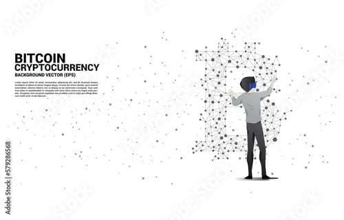Silhouette man wear VR glasses with bitcoin icon from Polygon dot connect line. Concept for cryptocurrency technology and financial network connection. © Panithan