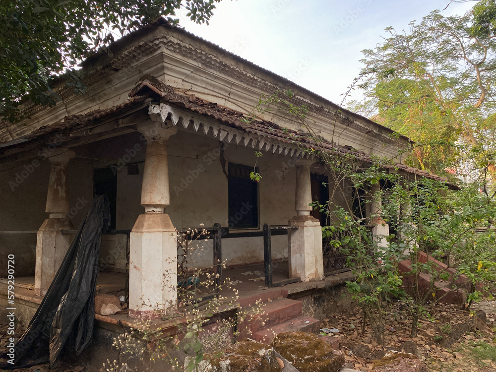 An old ruined house with traditional architecture in a village in Goa. An old ruined house with traditional architecture in a village in Goa.